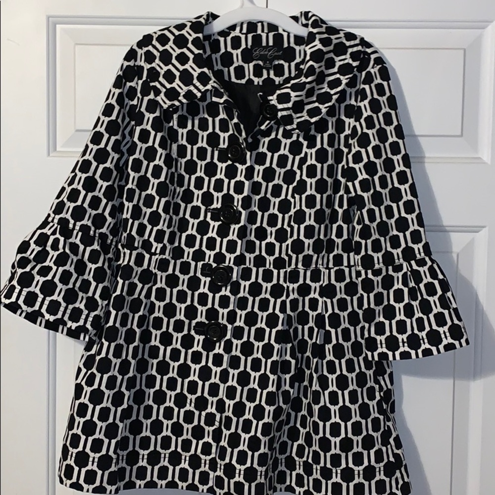 A black and white Eden Court jacket